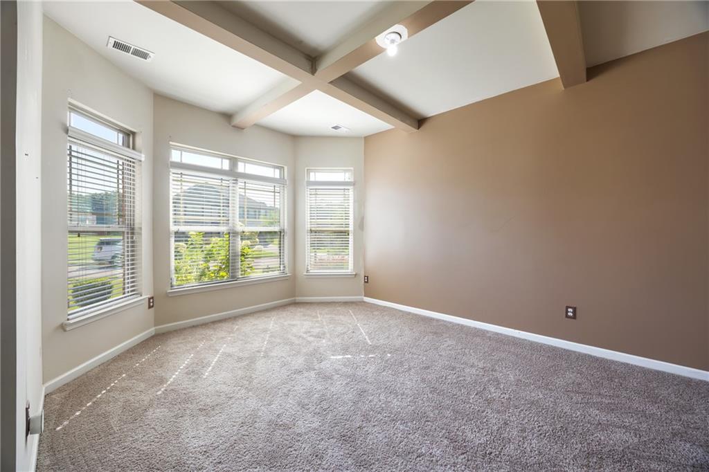 6891 Dresden Drive Rex, GA 30273 - Photo 5 of 26 an empty room with windows and closet