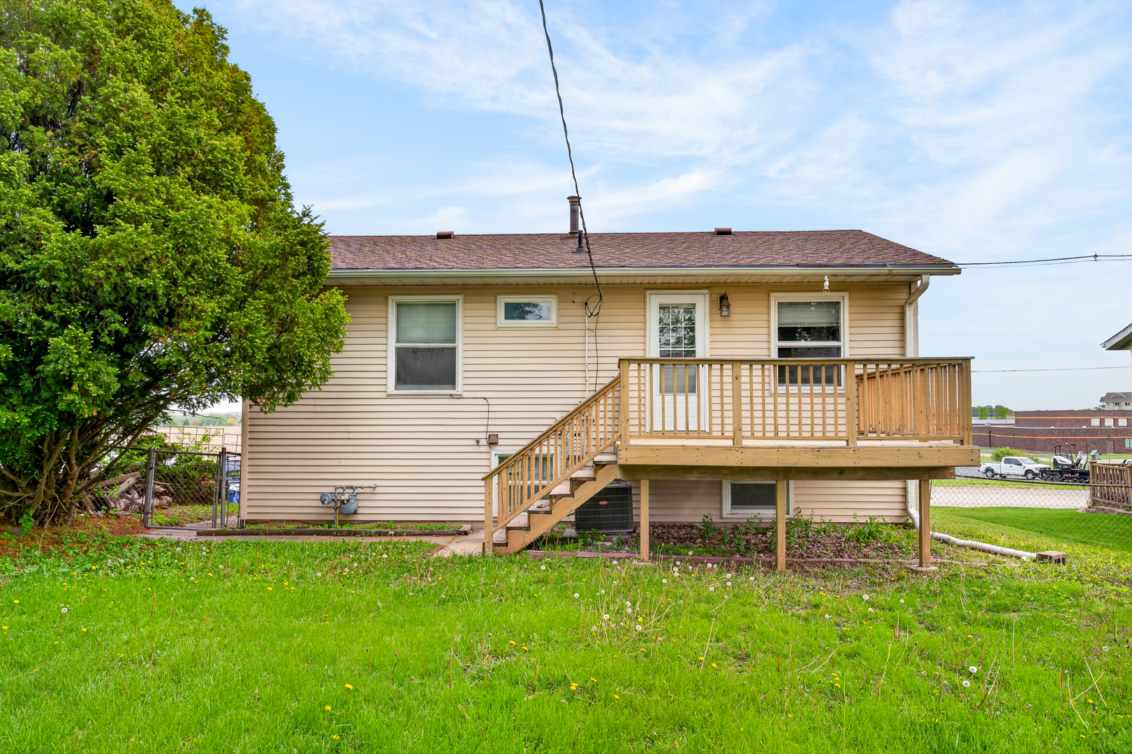 1229 13th Avenue North Clinton, IA 52732 - Photo 25 of 26 a backyard of a house with table and chairs