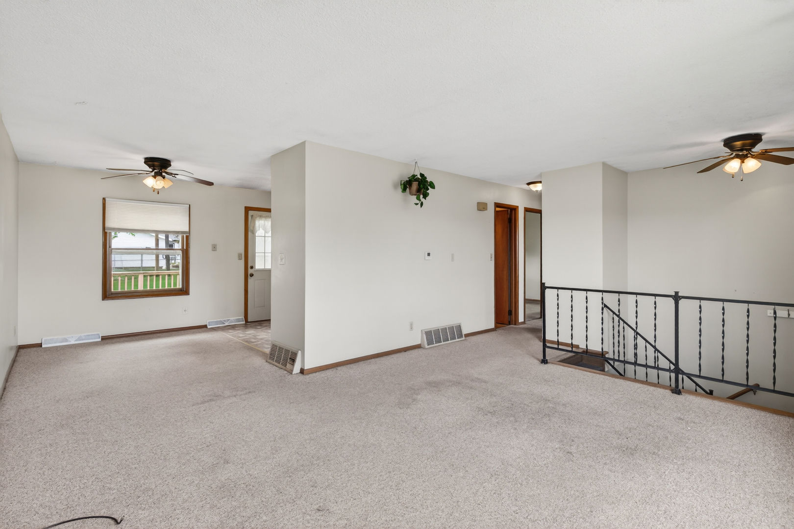 1229 13th Avenue North Clinton, IA 52732 - Photo 9 of 26 a view of an empty room with a window