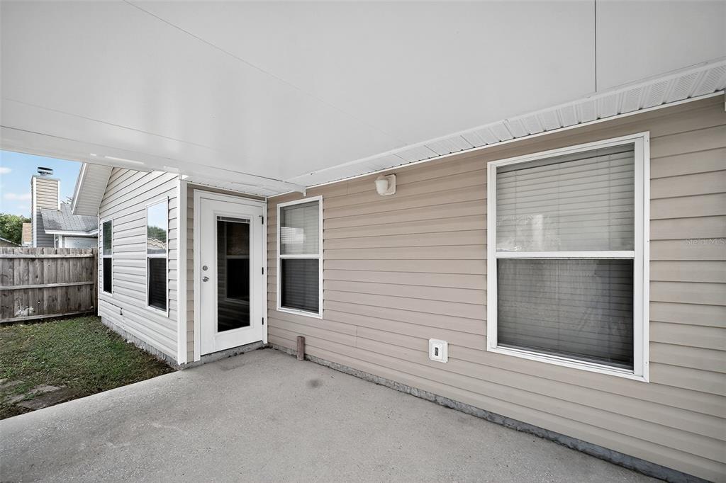 96025 Sunfish Lane Yulee, FL 32097 - Photo 4 of 17 a view of a house with garage