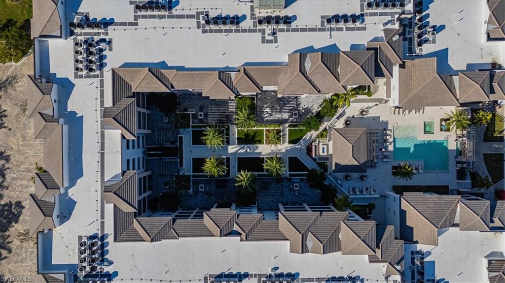 1130 3rd Avenue South, Unit 416 Naples, FL 34102 - Photo 47 of 49 a view of outdoor space and seating area