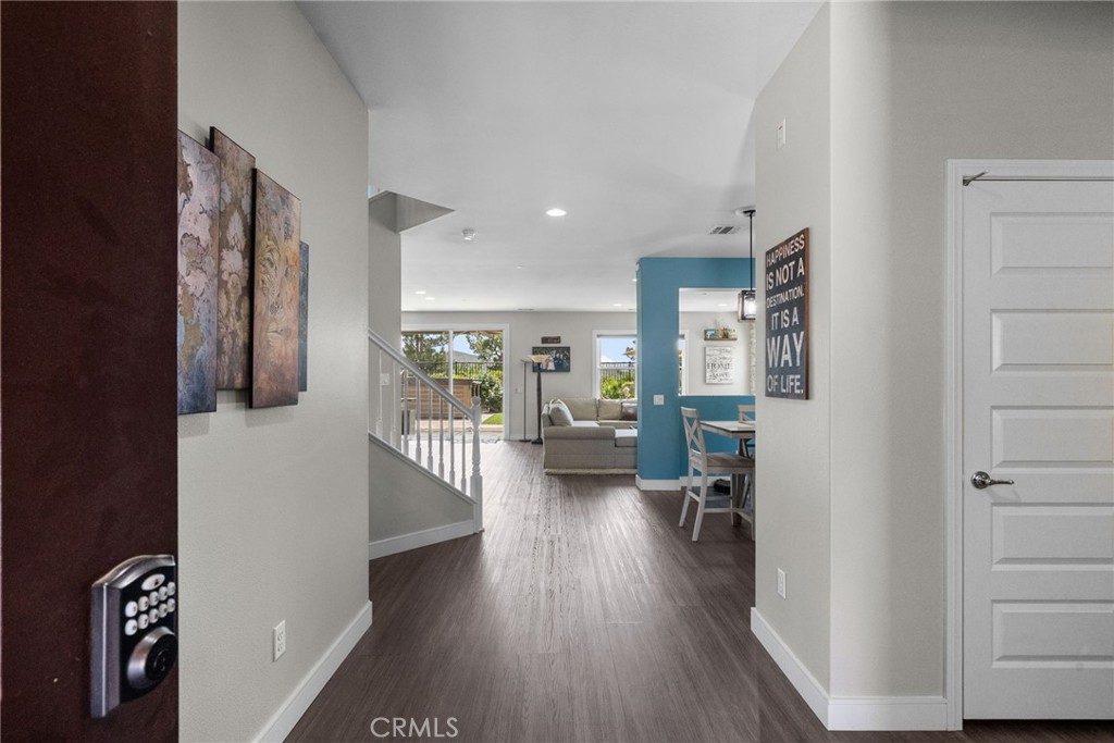 19512 Griffith Drive Saugus, CA 91350 - Photo 17 of 46 a hallway with wooden floor and furniture