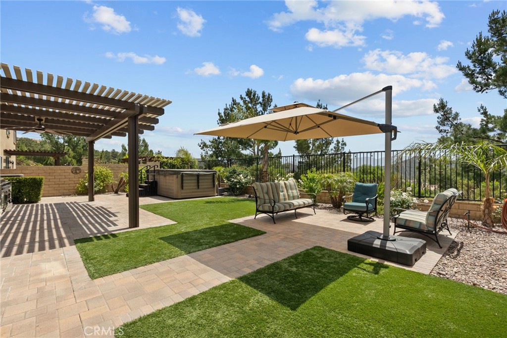 19512 Griffith Drive Saugus, CA 91350 - Photo 39 of 46 a view of a backyard with sitting area and furniture