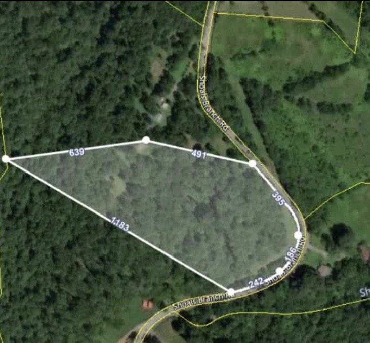 0 Shoals Branch Road Primm Springs, TN 38476 - Photo 1 of 3 an aerial view of a house