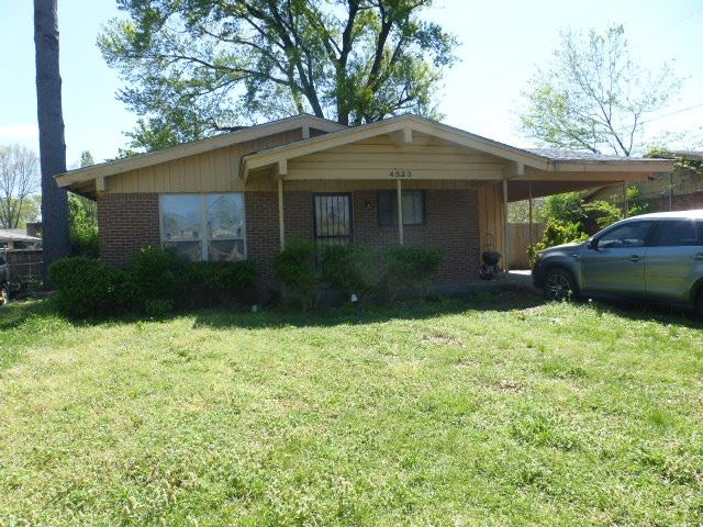 4523 Lawrence Road Memphis, TN 38122 - Photo 2 of 2 a backyard of a house with lots of green space