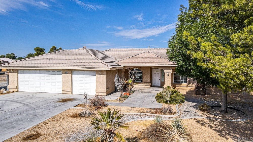 a front view of a house with a patio