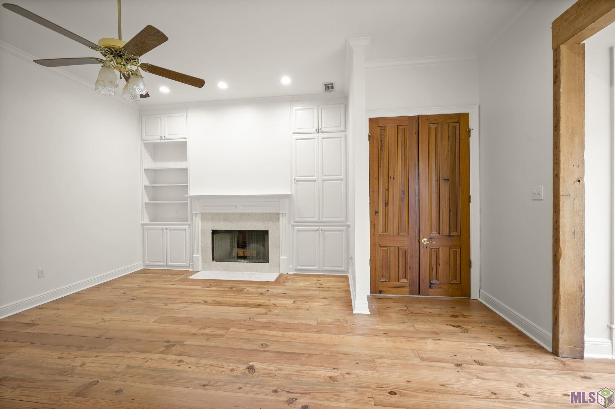 5515 North Pointer Court Baton Rouge, LA 70808 - Photo 21 of 47 Features Built-Ins & Fireplace
