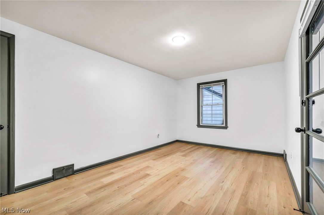 1352 Ford Road Lyndhurst, OH 44124 - Photo 9 of 48 Unfurnished room with light wood-type flooring