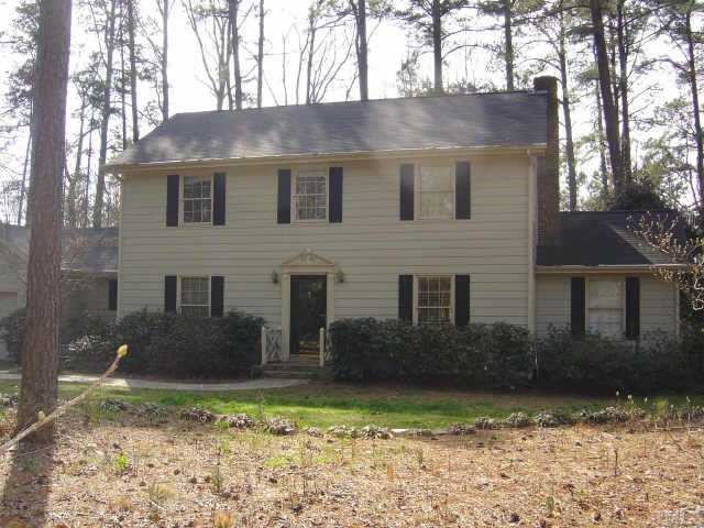 8209 Netherlands Drive Raleigh, NC 27606 - Photo 1 of 1 Colonial style home among mature landscaping & a private setting! Updates throughout- tile, fixtures, brand new carpet! No city taxes! Exterior Front