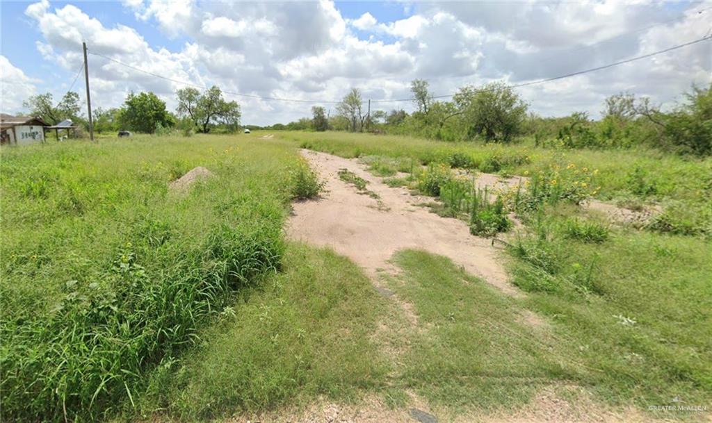 6608 North Moorefield Road Mission, TX 78573 - Photo 1 of 1 View of landscape featuring a rural view