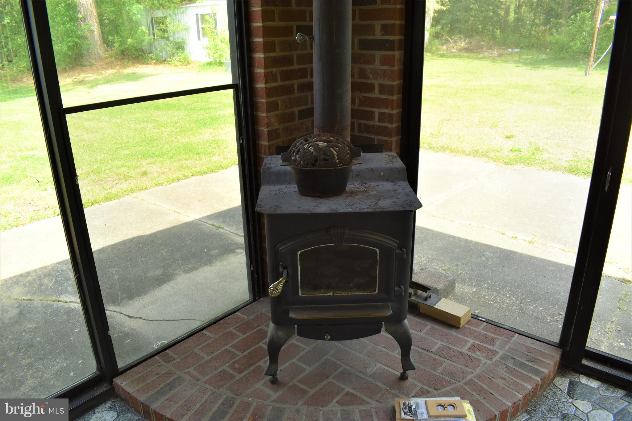 176 Ironmine Road Felton, DE 19943 - Photo 23 of 37 Woodstove