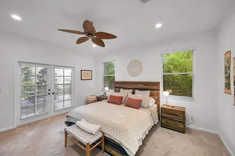 a bed room with a bed and a window