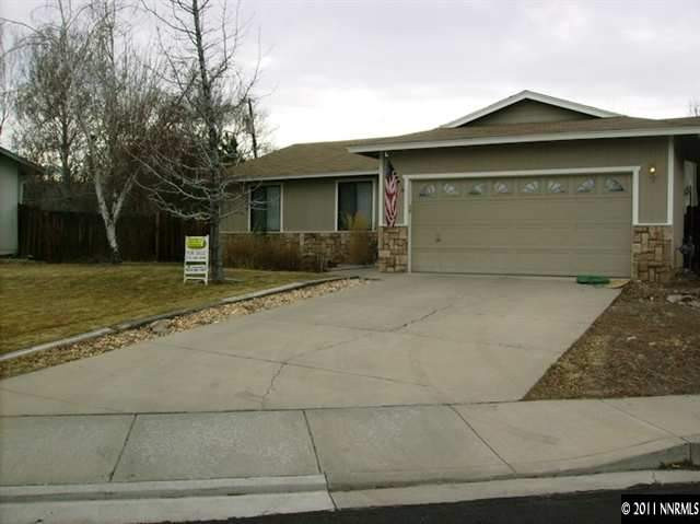 a front view of a house with yard