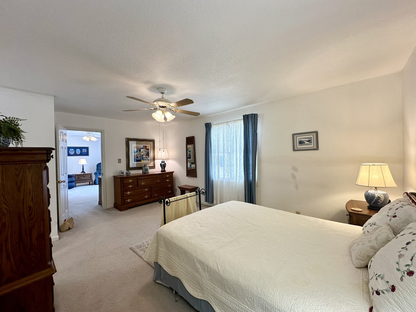 8752 Wagon Trail Road Clinton, IL 61727 - Photo 16 of 19 a bed room with a bed and a couch