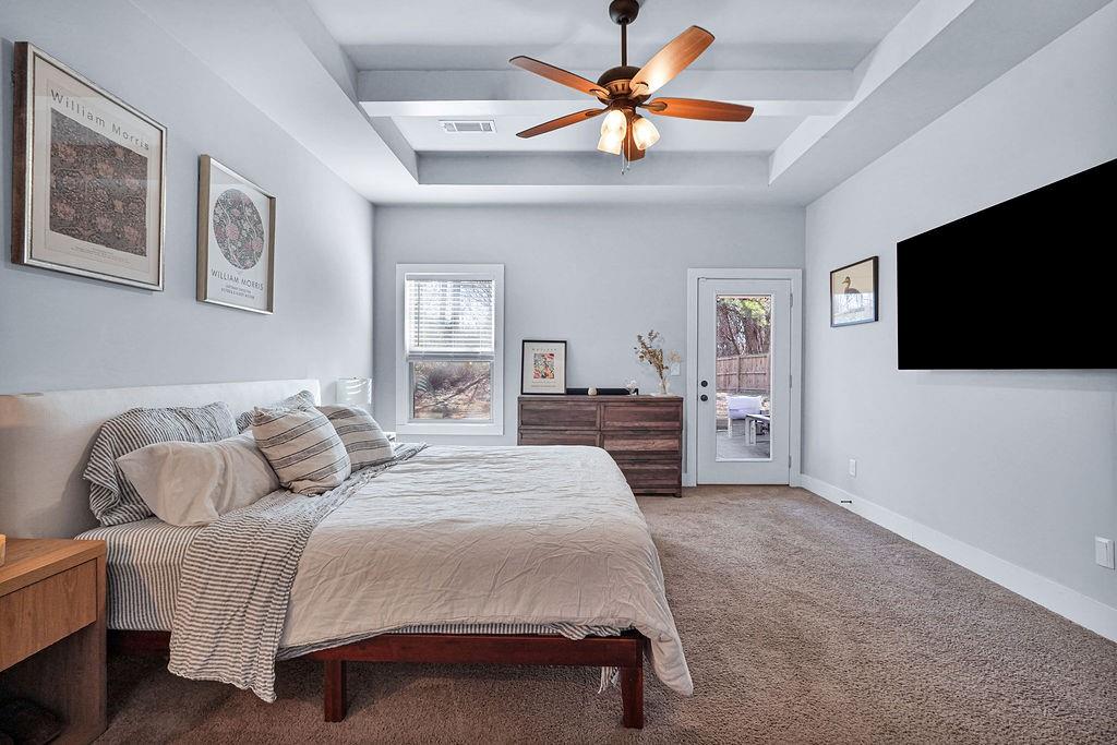 1201 Shiva Boulevard Winder, GA 30680 - Photo 25 of 84 a bedroom with a bed and a flat screen tv