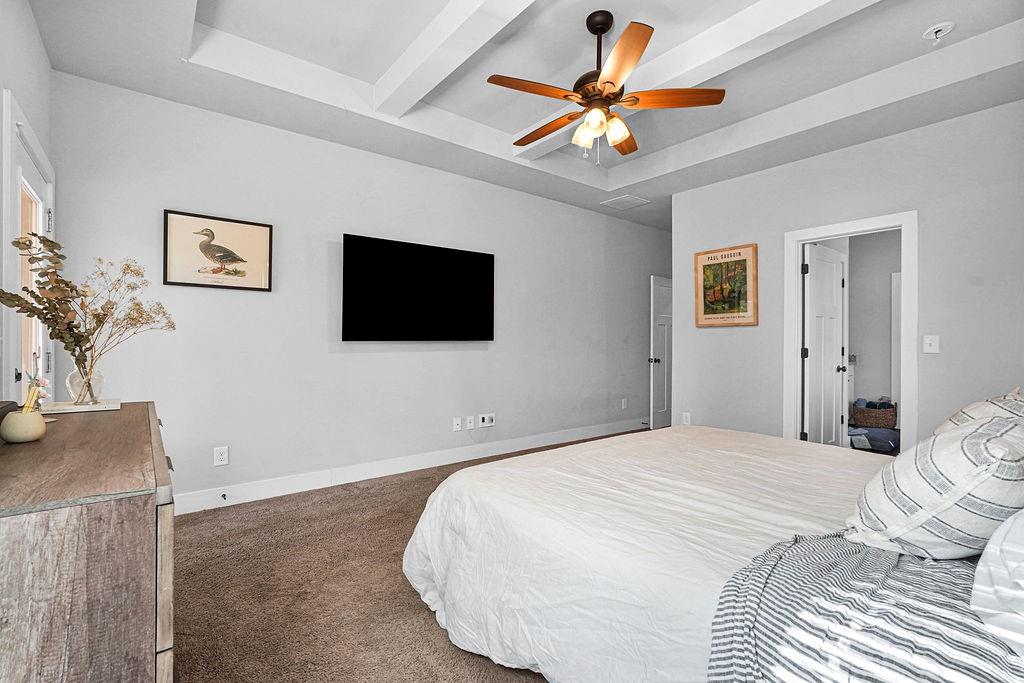 1201 Shiva Boulevard Winder, GA 30680 - Photo 26 of 84 a bedroom with a bed and a flat screen tv