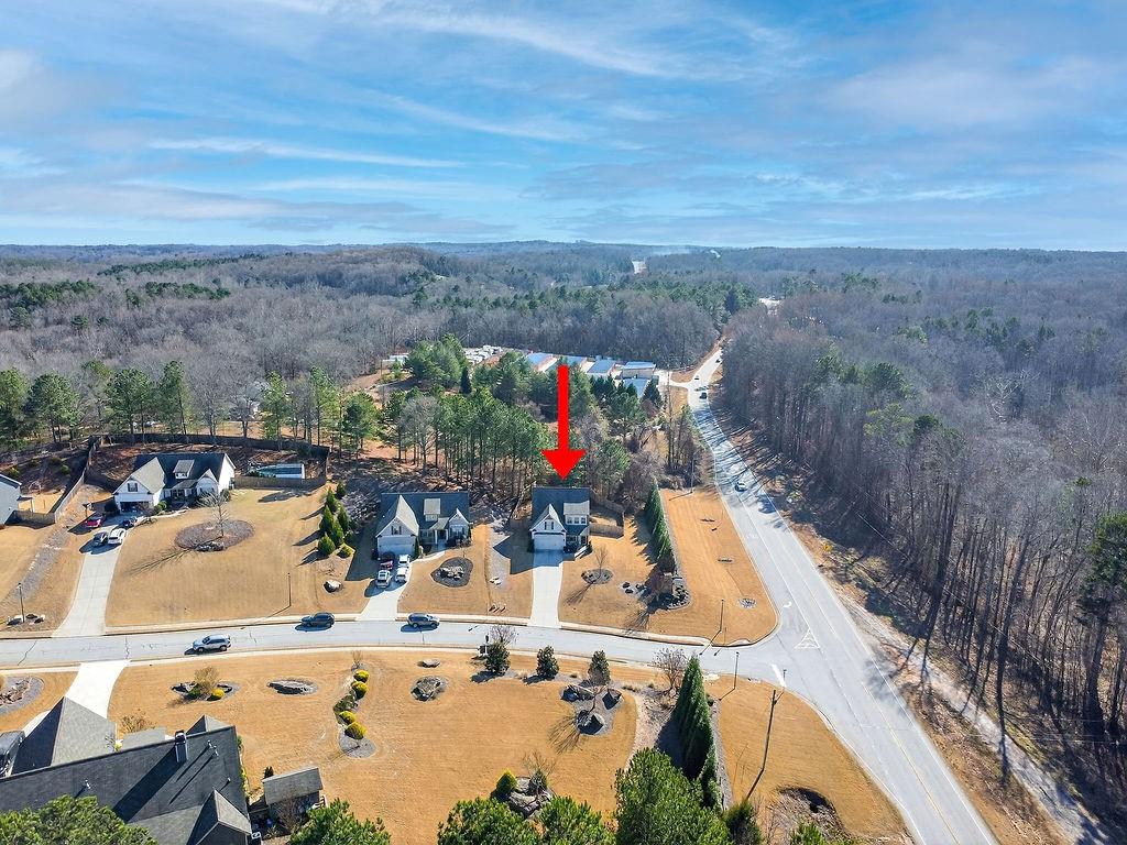 1201 Shiva Boulevard Winder, GA 30680 - Photo 77 of 84 an aerial view of a house with a swimming pool