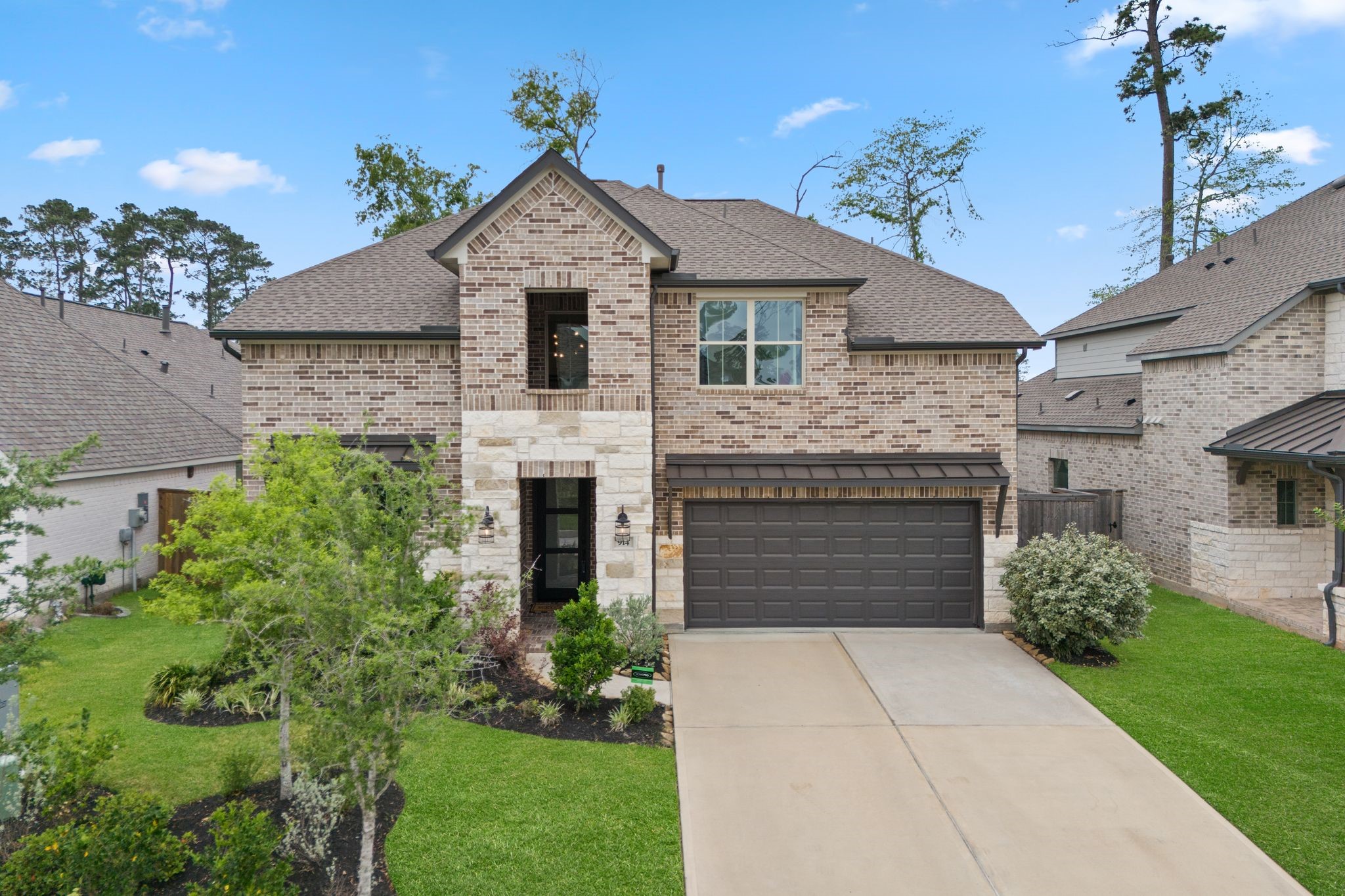 Welcome to 914 Sendero Trail, an elegant two-story brick and stone home with charming curb appeal!