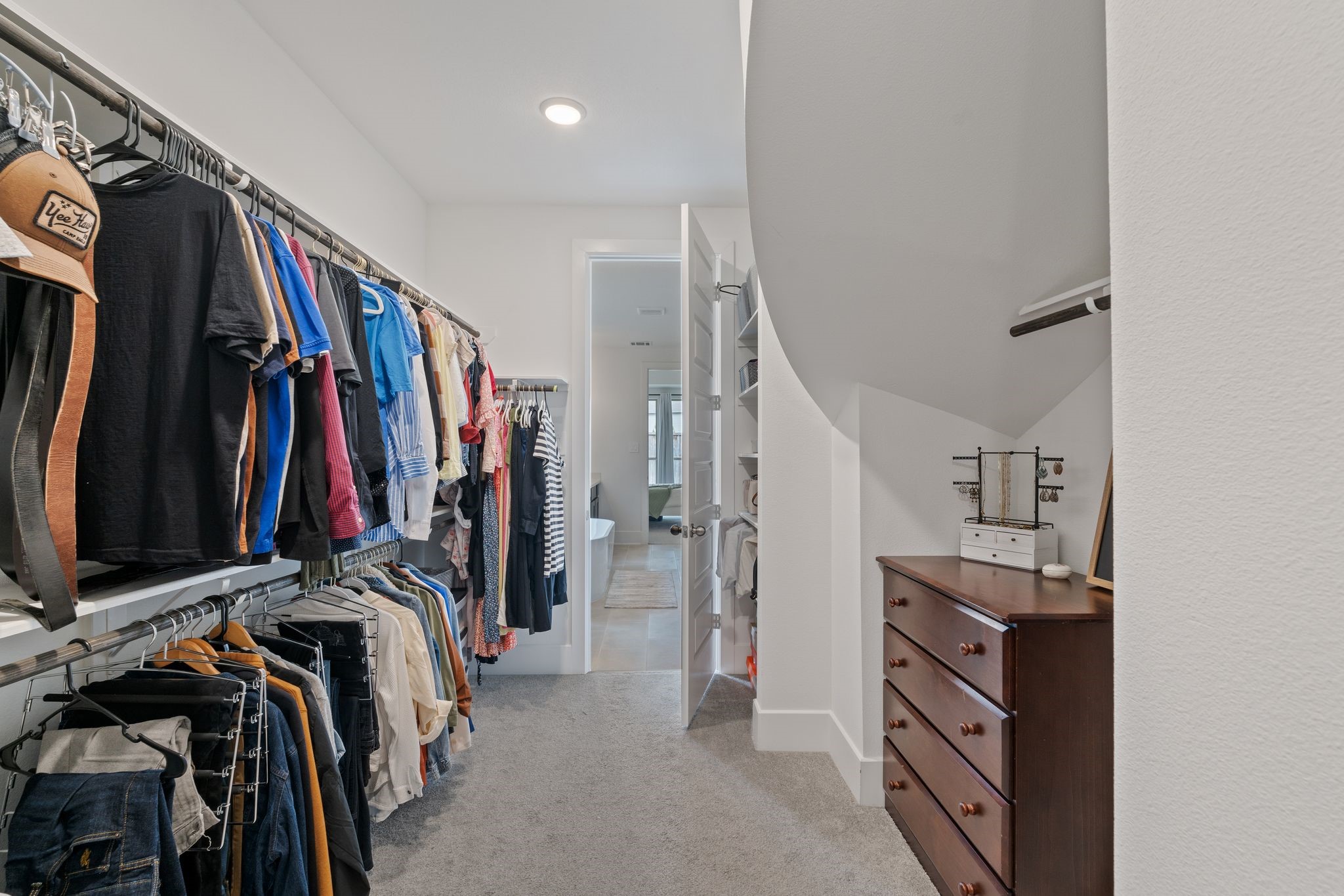 914 Sendero Trail Conroe, TX 77304 - Photo 23 of 47 Large walk-in closet with abundant hanging space and shelving.