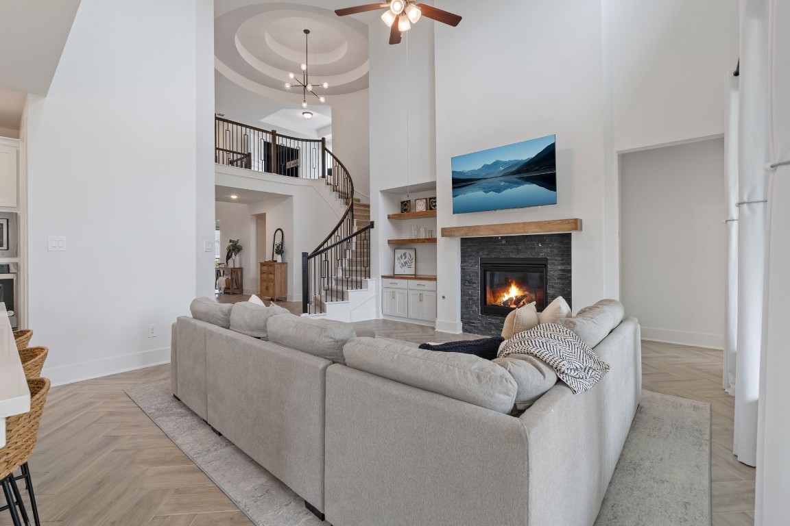 914 Sendero Trail Conroe, TX 77304 - Photo 3 of 50 a living room with furniture and a fireplace