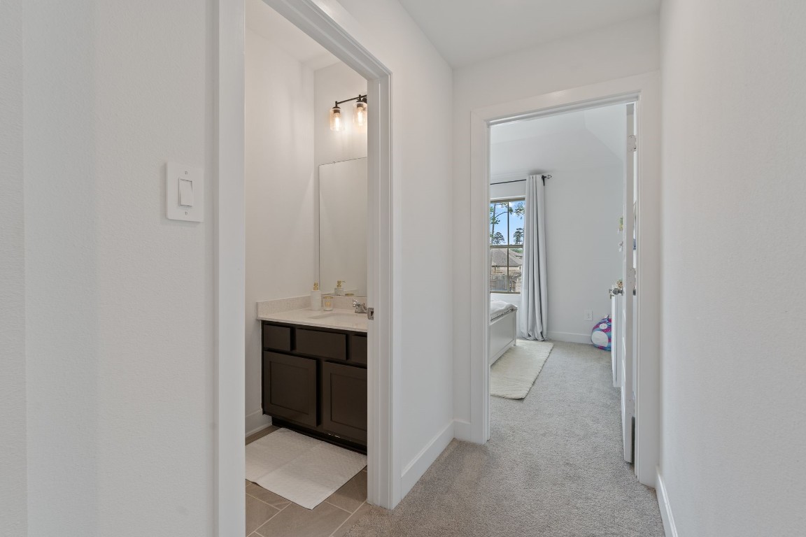 914 Sendero Trail Conroe, TX 77304 - Photo 33 of 50 a view of an empty room with closet and wooden floor