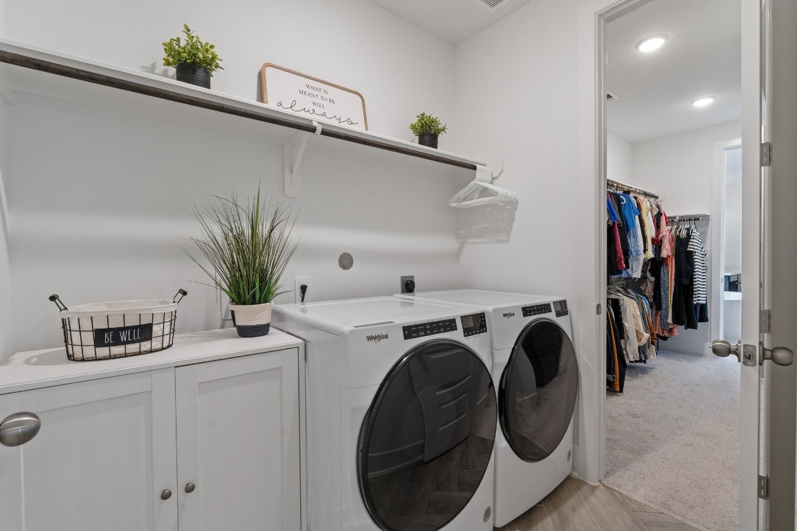 914 Sendero Trail Conroe, TX 77304 - Photo 40 of 50 Spacious Laundry Room leads to the primary bedroom, for added convenience.