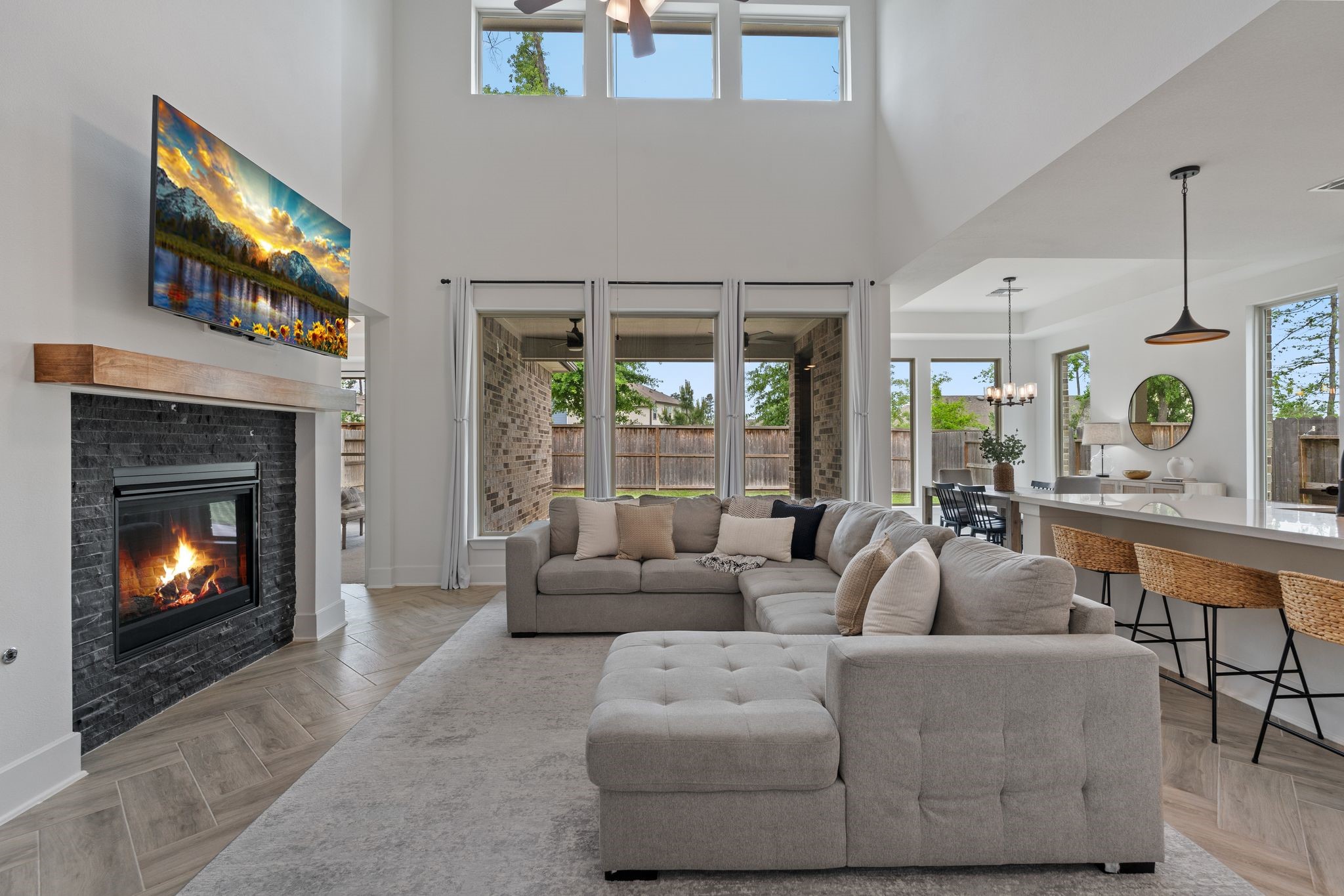 914 Sendero Trail Conroe, TX 77304 - Photo 9 of 47 Open-concept layout connects the living to the kitchen, creating a bright spacious flow. Ideal for both everyday living and entertaining.