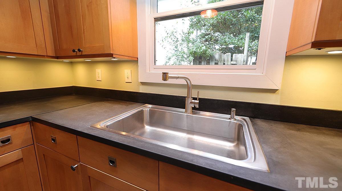 829 Runnymede Road Raleigh, NC 27607 - Photo 10 of 29 a close view of sink and tap