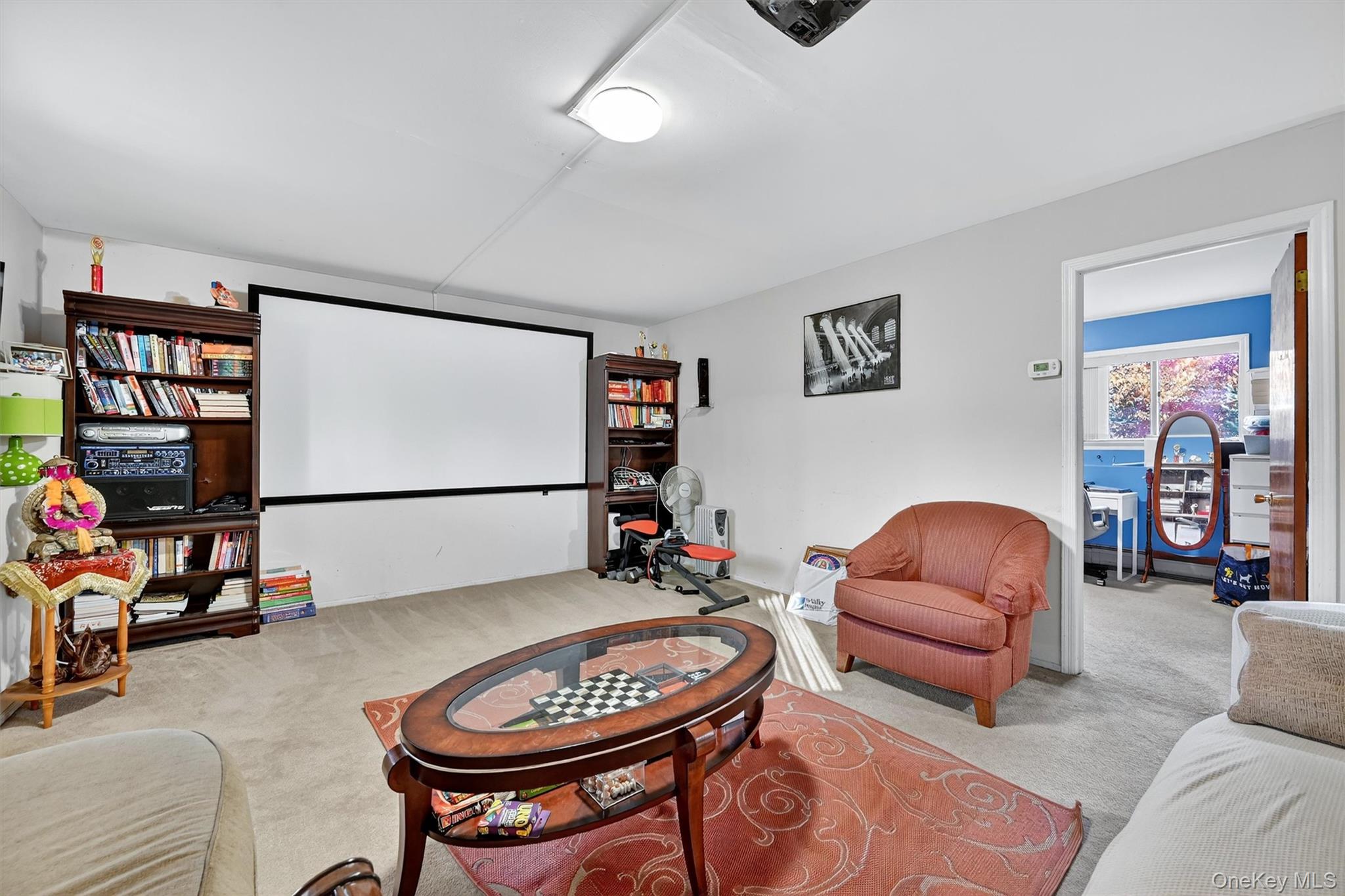 5 Schettig Court Spring Valley, NY 10977 - Photo 20 of 26 a living room with furniture a rug and white walls