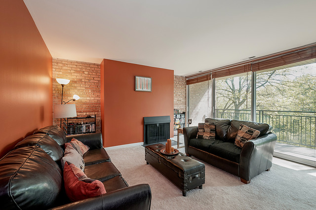 6017 Forest View Road, Unit 2C Lisle, IL 60532 - Photo 2 of 10 a living room with furniture and a large window