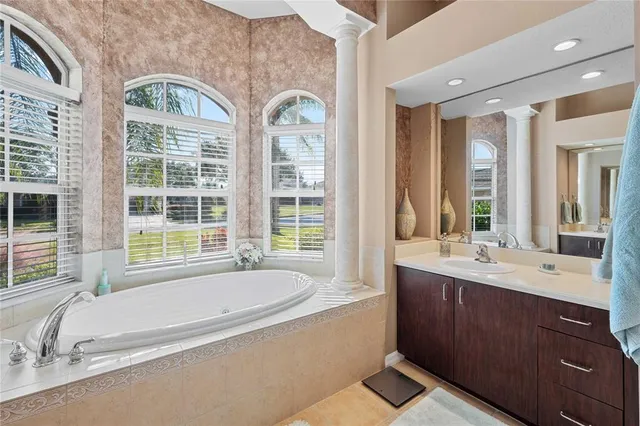 a view of a swimming pool with an ocean view