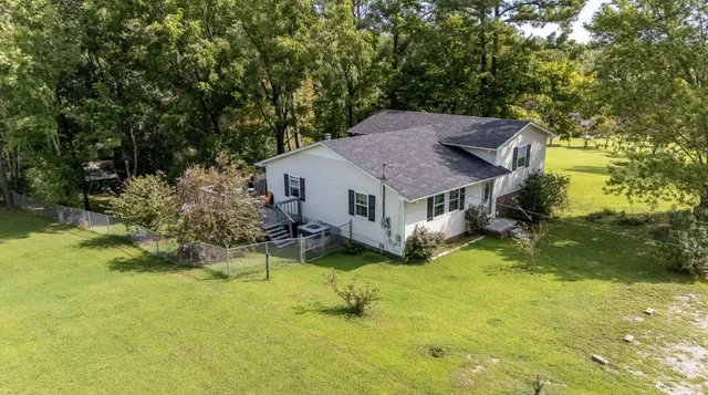 a house view with a garden space