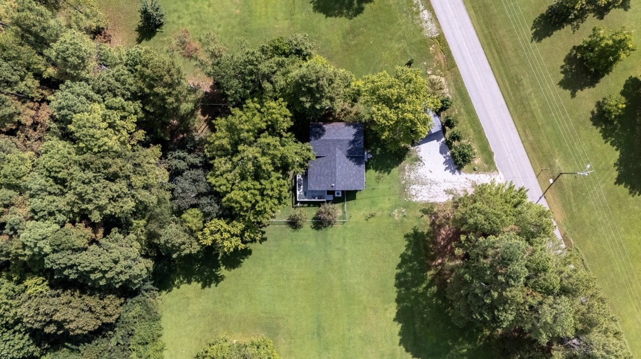 652 Old Florence Pulaski Road Leoma, TN 38468 - Photo 35 of 35 an aerial view of residential house with outdoor space and trees all around