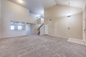 1275 Ophelia Road Forney, TX 75126 - Photo 2 of 10 an empty room with windows and fireplace