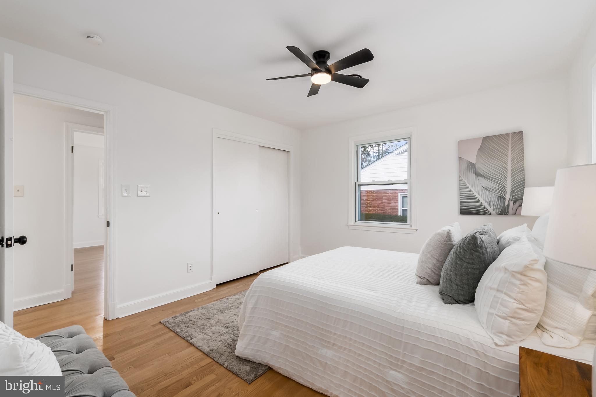 10319 Bethesda Church Road Damascus, MD 20872 - Photo 12 of 41 a bedroom with a bed and a window