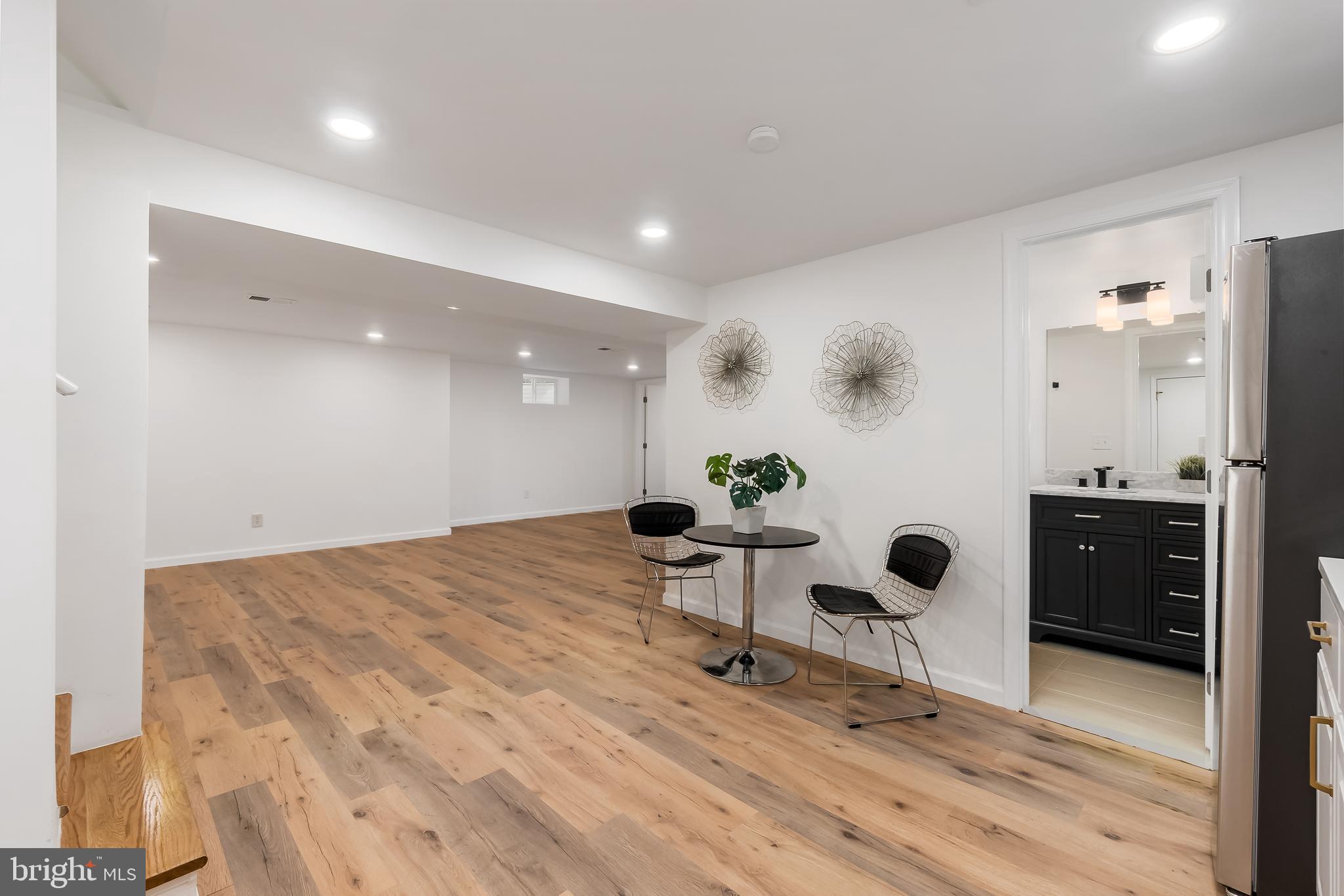 10319 Bethesda Church Road Damascus, MD 20872 - Photo 24 of 41 a view of kitchen and living room