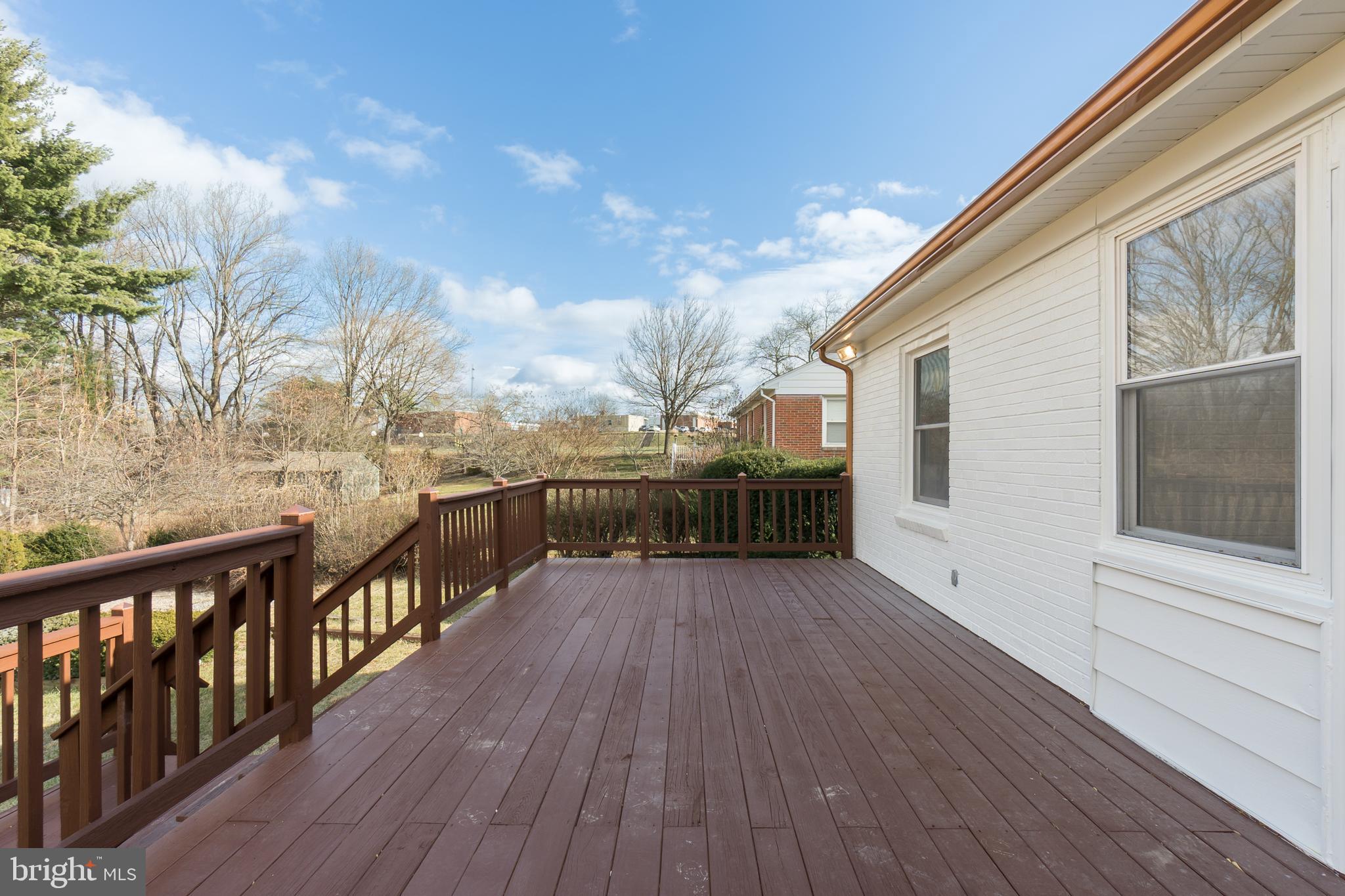 10319 Bethesda Church Road Damascus, MD 20872 - Photo 32 of 41 a view of a balcony with wooden floor