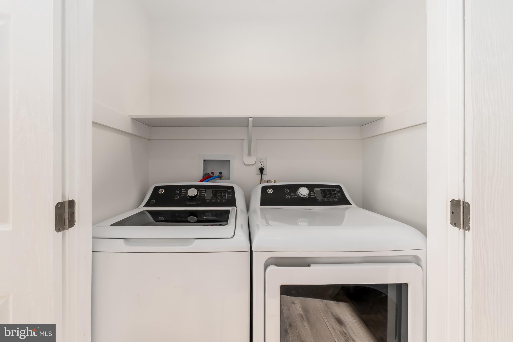 10319 Bethesda Church Road Damascus, MD 20872 - Photo 10 of 41 a utility room with dryer and washer
