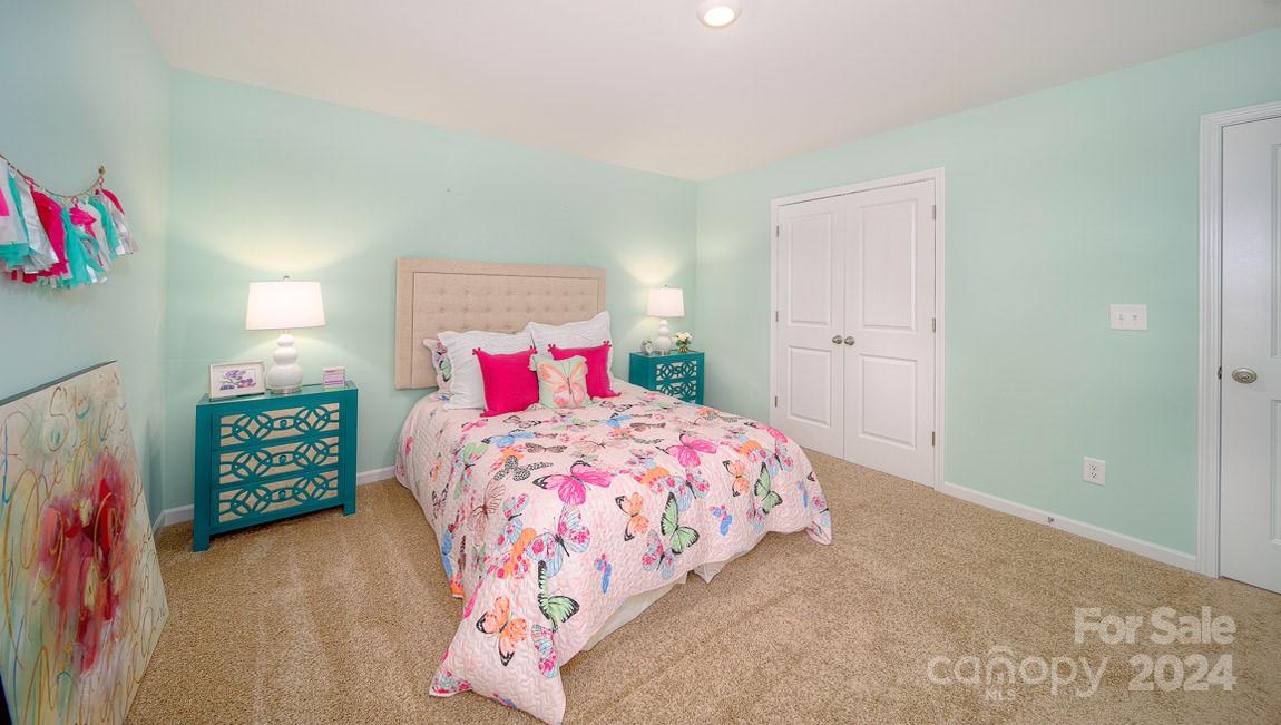 3627 Azalea Rdg Drive Mount Holly, NC 28120 - Photo 18 of 34 a bedroom with a bed and a window