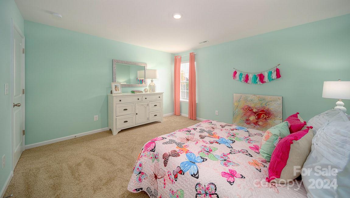 3627 Azalea Rdg Drive Mount Holly, NC 28120 - Photo 19 of 34 a bedroom with a bed and a dresser