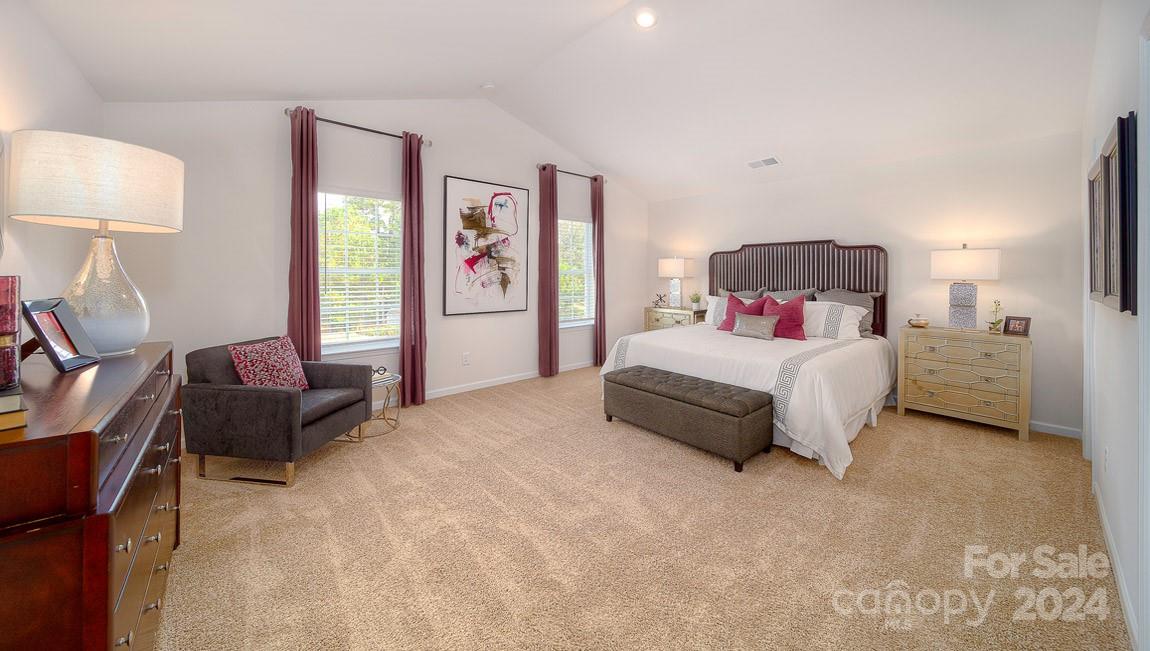 3627 Azalea Rdg Drive Mount Holly, NC 28120 - Photo 21 of 34 a bedroom with a bed and a lamp