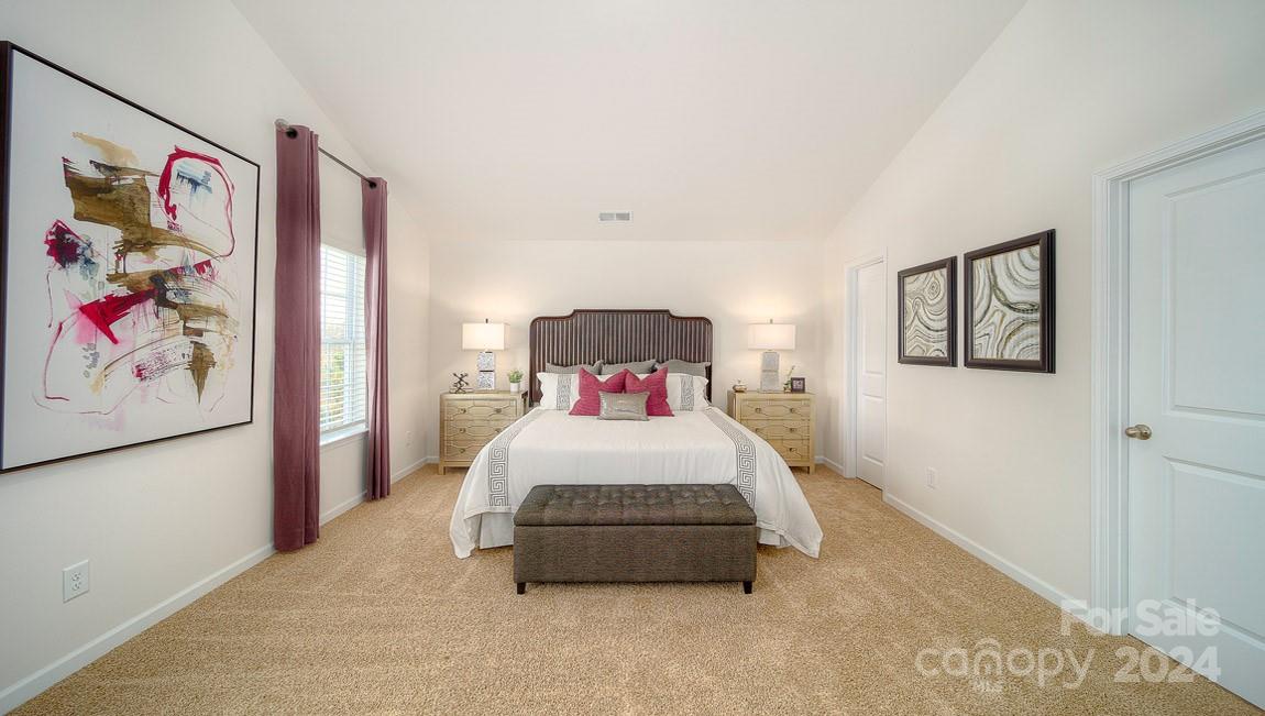 3627 Azalea Rdg Drive Mount Holly, NC 28120 - Photo 23 of 34 a bedroom with a bed and wall painting