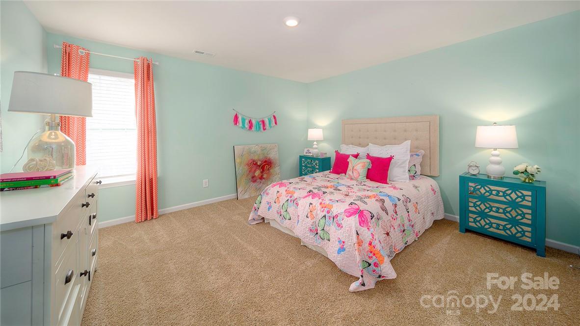 3627 Azalea Rdg Drive Mount Holly, NC 28120 - Photo 33 of 34 a bedroom with a bed and a dresser