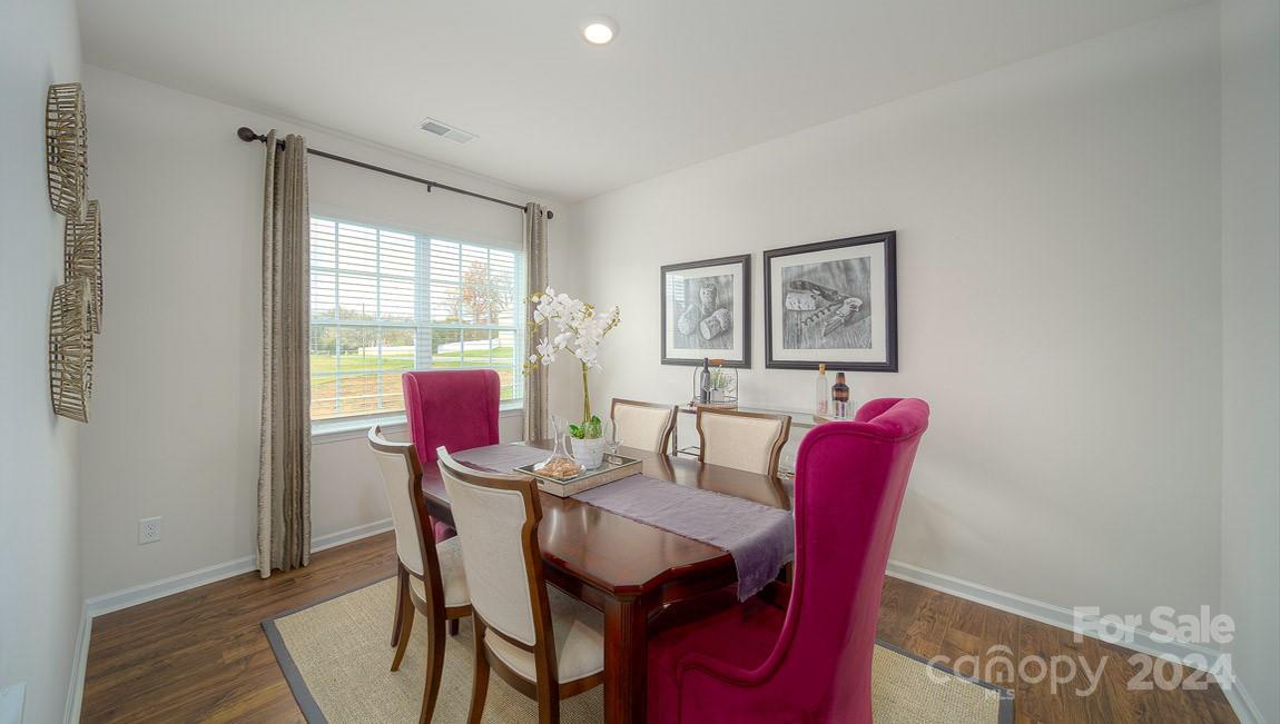 3627 Azalea Rdg Drive Mount Holly, NC 28120 - Photo 7 of 34 a view of a dining room with furniture and window