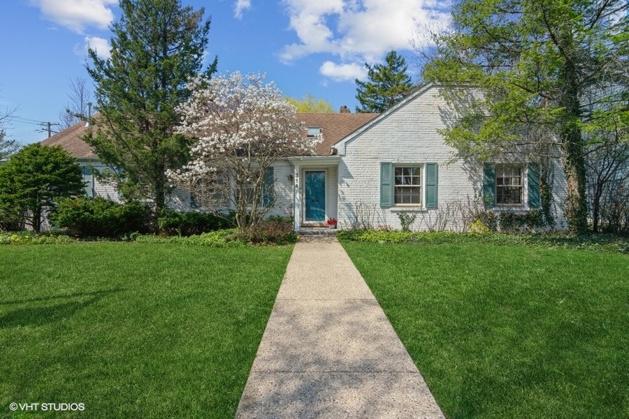 314 Wagner Road Northfield, IL 60093 - Photo 1 of 17 front view of a house with a yard
