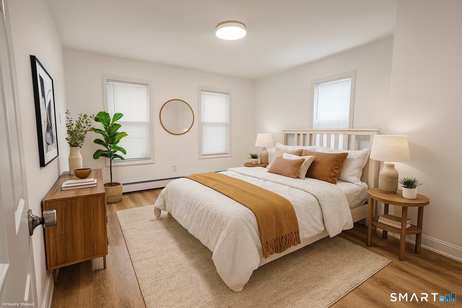 98 Franklin Avenue, Unit 1 Hartford, CT 06114 - Photo 5 of 7 a bedroom with a bed lamps and window