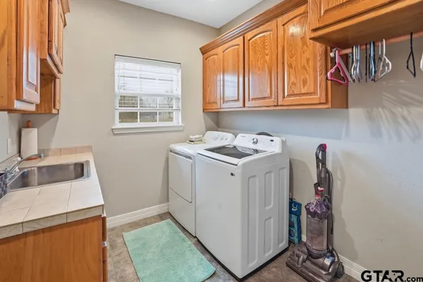 a utility room with dryer and washer