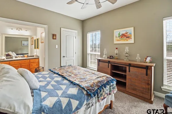 a bedroom with a bed and furniture