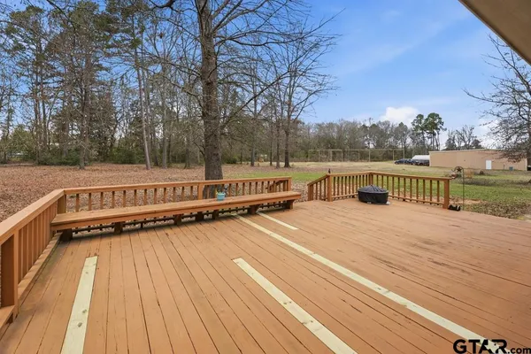 an aerial view of a house with outdoor space