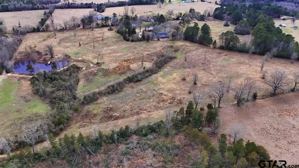 a view of a backyard of a house